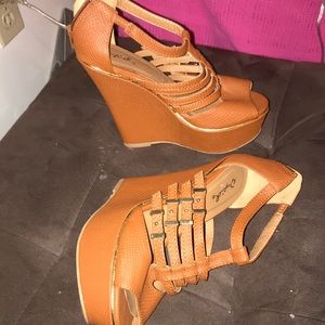 High heeled brown with gold. Size 7.
